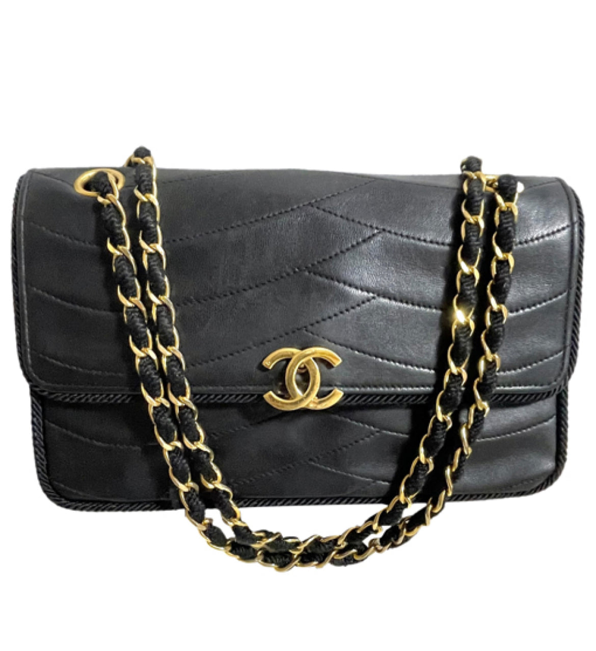 80's vintage Chanel black 2.55 shoulder bag with wavy stitches and rope strings and gold chain strap. Very rare piece from the era. 050730ra