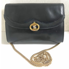 Vintage CELINE genuine black leather shoulder bag with gold and silver tone triomphe logo motif at front. Rare Celine leather bag.