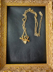 W3. Vintage Yves Saint Laurent golden YSL logo and heart crystal necklace. Must have jewelry piece. 050611ya