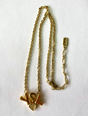 W3. Vintage Yves Saint Laurent golden YSL logo and heart crystal necklace. Must have jewelry piece. 050611ya