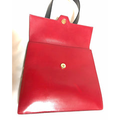 Vintage Karl Lagerfeld red and black double face shoulder bag with golden logo motifs. Rare unique bag. Must have. 060605r1