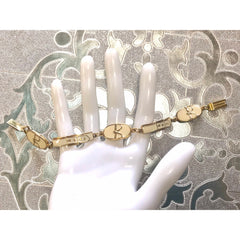 Vintage Roberta di Camerino chain bracelet with white logo charms. Beautiful jewelry. 0602071