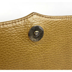 Vintage Cartier yellow mustard leather shoulder purse with gold-tone logo charm and wine leather tassel charm. Must de cartier collection
