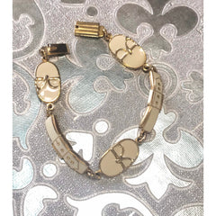 Vintage Roberta di Camerino chain bracelet with white logo charms. Beautiful jewelry. 0602071