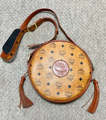 Vintage MCM brown monogram round Suzy Wong shoulder bag with brown leather trimmings. Designed by Michael Cromer. Unisex. 050715ya1