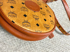 Vintage MCM brown monogram round Suzy Wong shoulder bag with brown leather trimmings. Designed by Michael Cromer. Unisex. 050715ya1