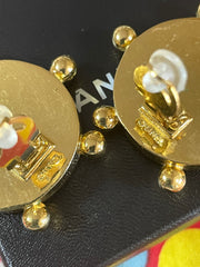 Vintage CHANEL large round earrings with black and golden CC mark. Sun design. 050630ac