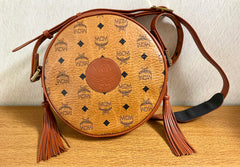 Vintage MCM brown monogram round Suzy Wong shoulder bag with brown leather trimmings. Designed by Michael Cromer. Unisex. 050715ya1