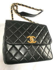 Vintage Chanel classic large black lambskin 2.55 square shape chain shoulder bag with golden large CC closure. Must have purse. 0404081