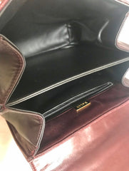 Vintage BALLY wine brown quilted lambskin handbag with golden logo turn lock closure. 050425r1
