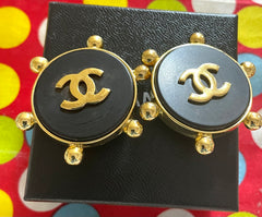 Vintage CHANEL large round earrings with black and golden CC mark. Sun design. 050630ac