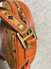 Vintage MCM brown monogram round Suzy Wong shoulder bag with brown leather trimmings. Designed by Michael Cromer. Unisex. 050715ya1