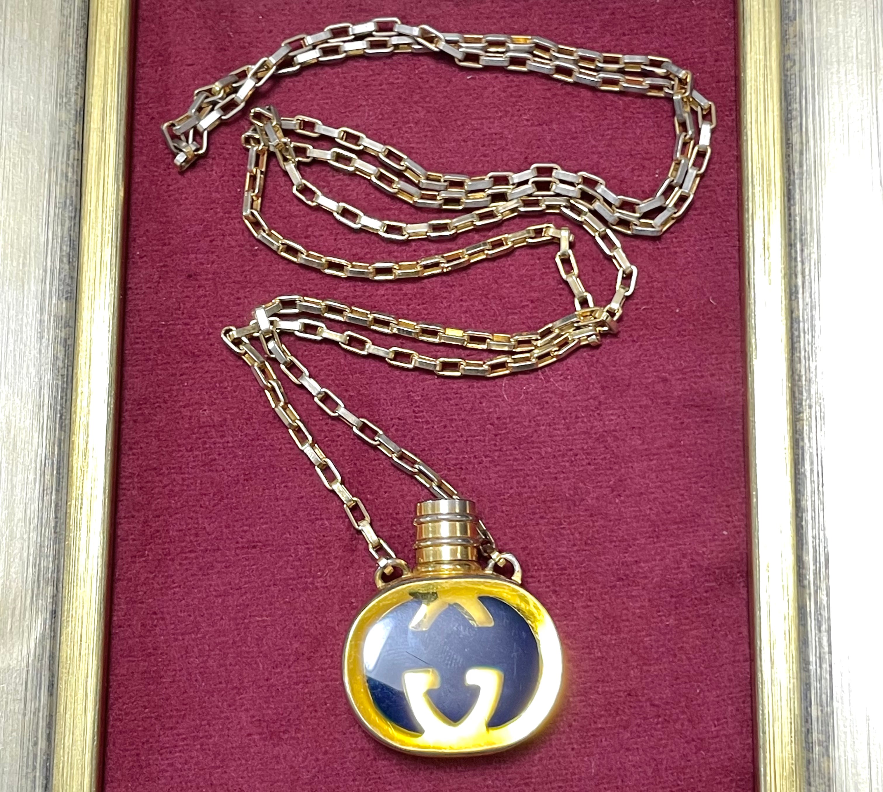 W2 80’s vintage Gucci golden chain long necklace with navy motif perfume bottle. Rare Gucci vintage jewelry. 050527ya1