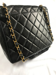 Vintage Chanel classic large black lambskin 2.55 square shape chain shoulder bag with golden large CC closure. Must have purse. 0404081