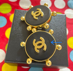 Vintage CHANEL large round earrings with black and golden CC mark. Sun design. 050630ac
