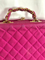 Vintage CHANEL pink canvas business bag style handbag with golden chain handle and a logo charm. Rare and collectible piece.
