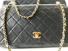 Vintage Chanel black leather 2.55 chain large shoulder bag with white trimming edge and a matching pouch. 0403284