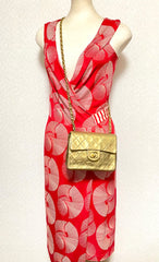 Vintage CHANEL golden lambskin flap chain shoulder bag, classic 2.55 mini purse with gold tone CC closure. 0409052