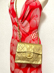 Vintage CHANEL golden lambskin flap chain shoulder bag, classic 2.55 mini purse with gold tone CC closure. 0409052
