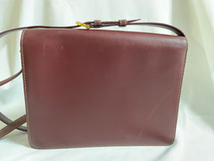 Vintage Cartier double flap envelope shoulder bag with gold-tone logo charm closure and frames. Classic purse from Must de Cartier. 0408172