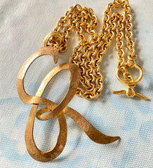 Vintage Sonia Rykiel golden chain necklace with large logo pendant top. Perfect vintage jewelry from SR. 0407152