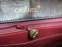 Vintage Chanel black lambskin chain 2.55 shoulder bag with gold chain. Unique hexagon shaped flap. 0407012