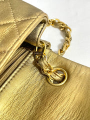 Vintage CHANEL golden lambskin flap chain shoulder bag, classic 2.55 mini purse with gold tone CC closure. 0409052