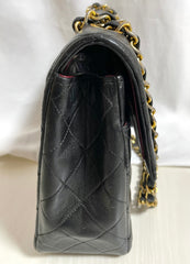 80's vintage Chanel black 2.55 shoulder bag with circle CC flap design. Rare piece from the era. 0410283
