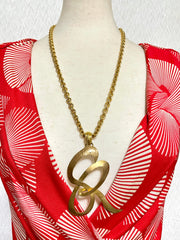 Vintage Sonia Rykiel golden chain necklace with large logo pendant top. Perfect vintage jewelry from SR. 0407152