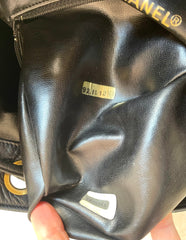 Vintage CHANEL black lambskin bucket hobo drum shoulder bag with golden chain strap, CC mark, and drawstring. 041205bs3