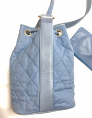 Vintage CHANEL blue quilted canvas and leather combo hobo bucket shoulder bag with drawstrings and golden CC mark balls. 060905r3