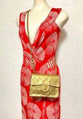 Vintage CHANEL golden lambskin flap chain shoulder bag, classic 2.55 mini purse with gold tone CC closure. 0409052