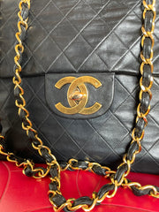 Vintage CHANEL black lamb leather large, jumbo size shoulder bag with big golden CC closure and chain strap. 2.55 classic purse. 050223rc1
