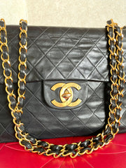 Vintage CHANEL black lamb leather large, jumbo size shoulder bag with big golden CC closure and chain strap. 2.55 classic purse. 050223rc1