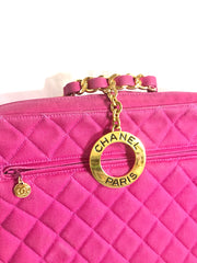 Vintage CHANEL pink canvas business bag style handbag with golden chain handle and a logo charm. Rare and collectible piece.
