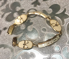 Vintage Roberta di Camerino chain bracelet with white logo charms. Beautiful jewelry.