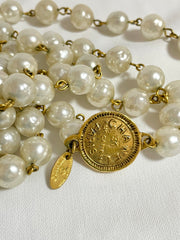 Vintage CHANEL faux pearl necklace, extra long necklace with golden round logo motif. Must have classic jewelry piece. 0408152
