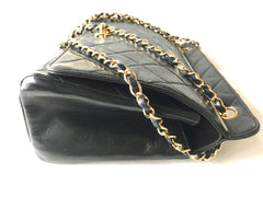 Vintage Chanel black leather 2.55 chain large shoulder bag with white trimming edge and a matching pouch. 0403284