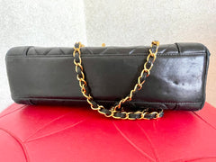 Vintage Chanel black lambskin chain 2.55 shoulder bag with gold chain. Unique hexagon shaped flap. 0407012