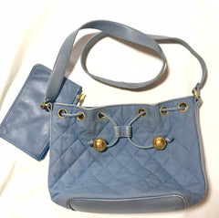 Vintage CHANEL blue quilted canvas and leather combo hobo bucket shoulder bag with drawstrings and golden CC mark balls. 060905r3