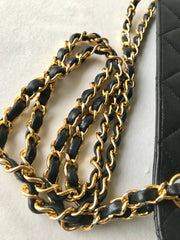 Vintage Chanel black leather 2.55 chain large shoulder bag with white trimming edge and a matching pouch. 0403284