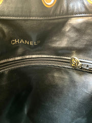 Vintage CHANEL black lambskin bucket hobo drum shoulder bag with golden chain strap, CC mark, and drawstring. 041205bs3