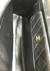 Vintage Chanel black leather 2.55 chain large shoulder bag with white trimming edge and a matching pouch. 0403284