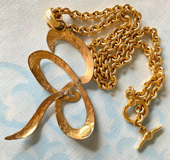 Vintage Sonia Rykiel golden chain necklace with large logo pendant top. Perfect vintage jewelry from SR. 0407152
