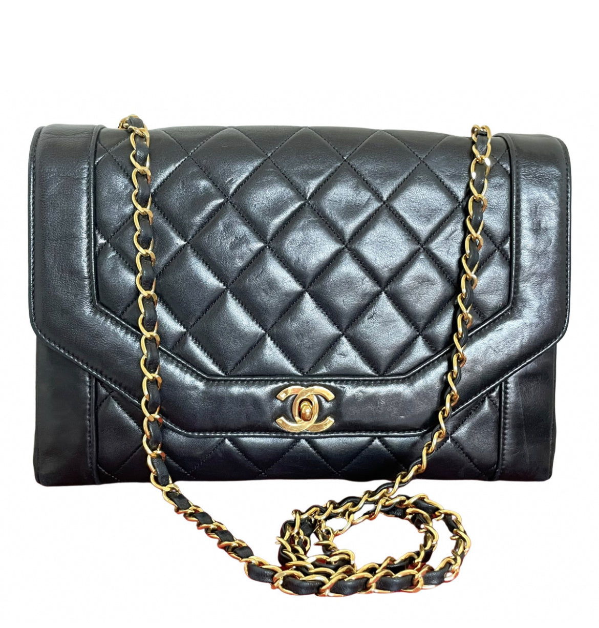 Vintage Chanel black lambskin chain 2.55 shoulder bag with gold chain. Unique hexagon shaped flap. 0407012
