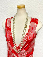 Vintage CHANEL faux pearl necklace, extra long necklace with golden round logo motif. Must have classic jewelry piece. 0408152