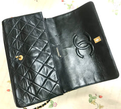 Vintage Chanel black leather 2.55 chain large shoulder bag with white trimming edge and a matching pouch. 0403284