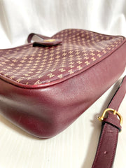 1980s. vintage Celine shoulder purse in bordeaux, burgundy leather with iconic blaison macadam print all over. riri zipper. 0411102