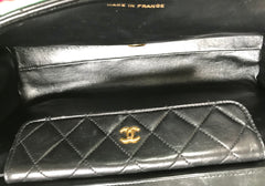 Vintage Chanel black leather 2.55 chain large shoulder bag with white trimming edge and a matching pouch. 0403284