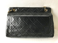 Vintage Chanel black leather 2.55 chain large shoulder bag with white trimming edge and a matching pouch. 0403284